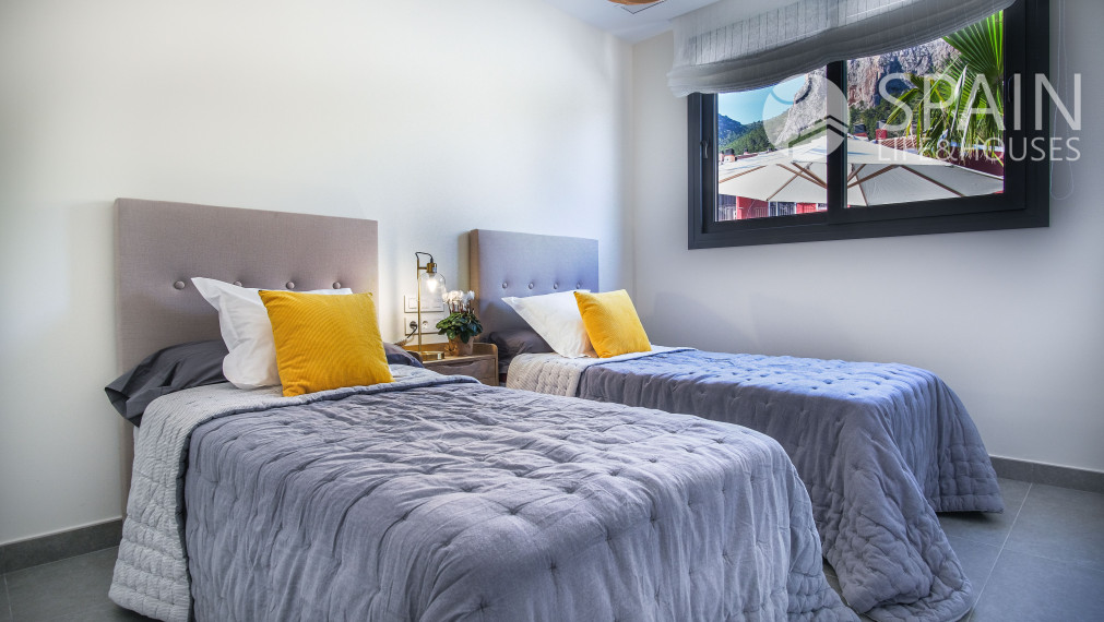 Posledné domy vo fáze E. Novostavba 2 a 3-izbových domov s bazénom, Polop de la Marina, Alicante